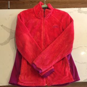 Woman’s North Face zip up fuzzy fleece jacket.